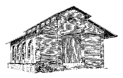 Southern Freight Station. Line drawing of large brick freight house with large arched doors. 
The roof features a large clerestory running its length. 
The model sits atop a concrete platform skirted with concrete cinder blocks.