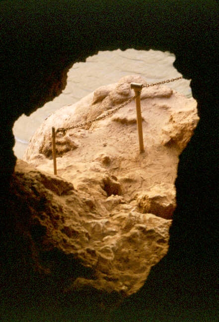 a hole in the rock formation.