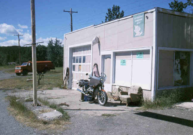 My poor bike sits in front of the abandoned gas station in East Glacier.